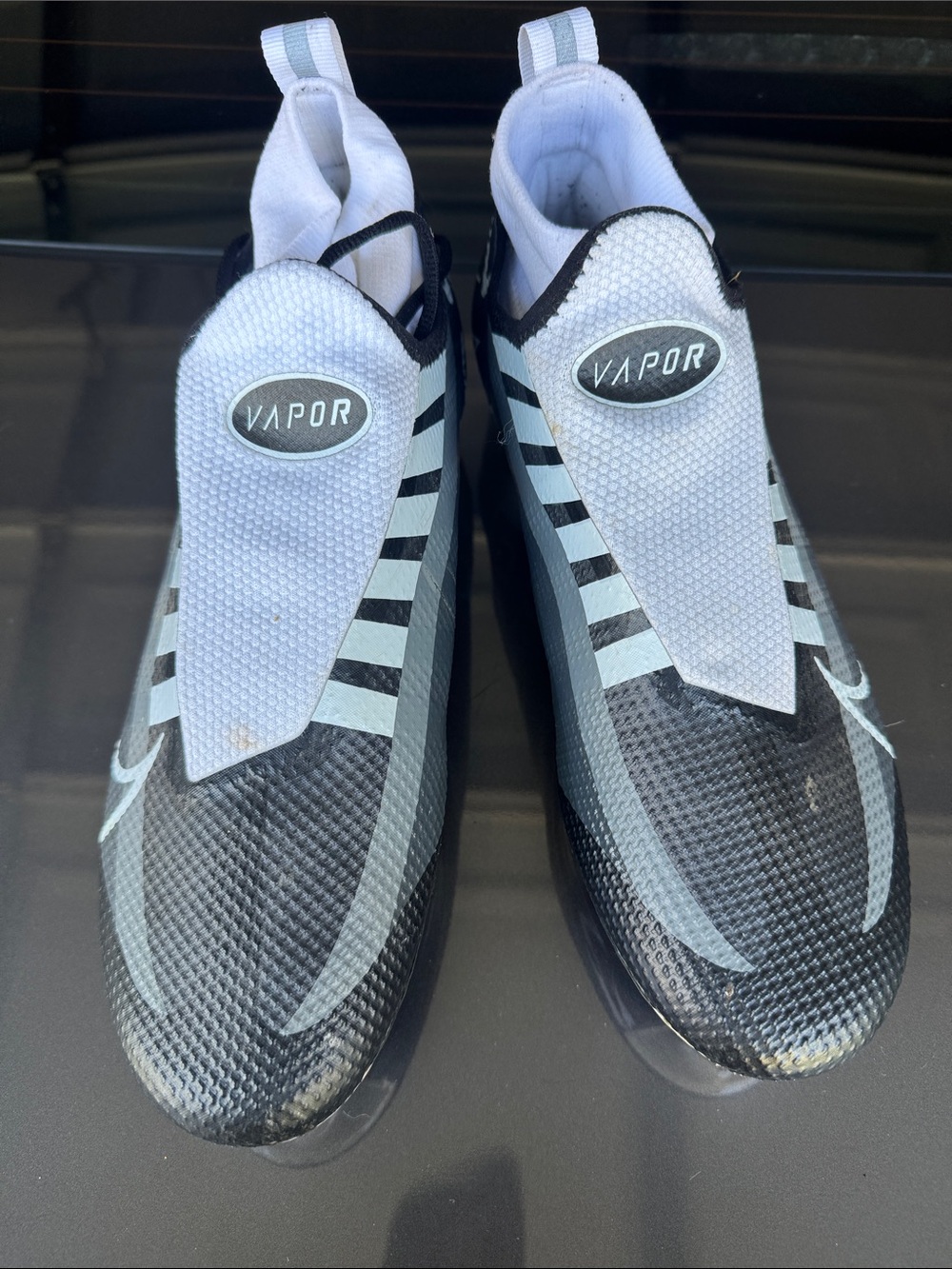 Boys Vapor Slip-On Athletic Cleats in Black and Light Blue